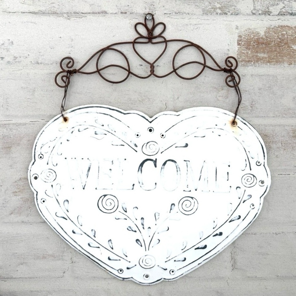White Heart-Shaped Welcome Sign